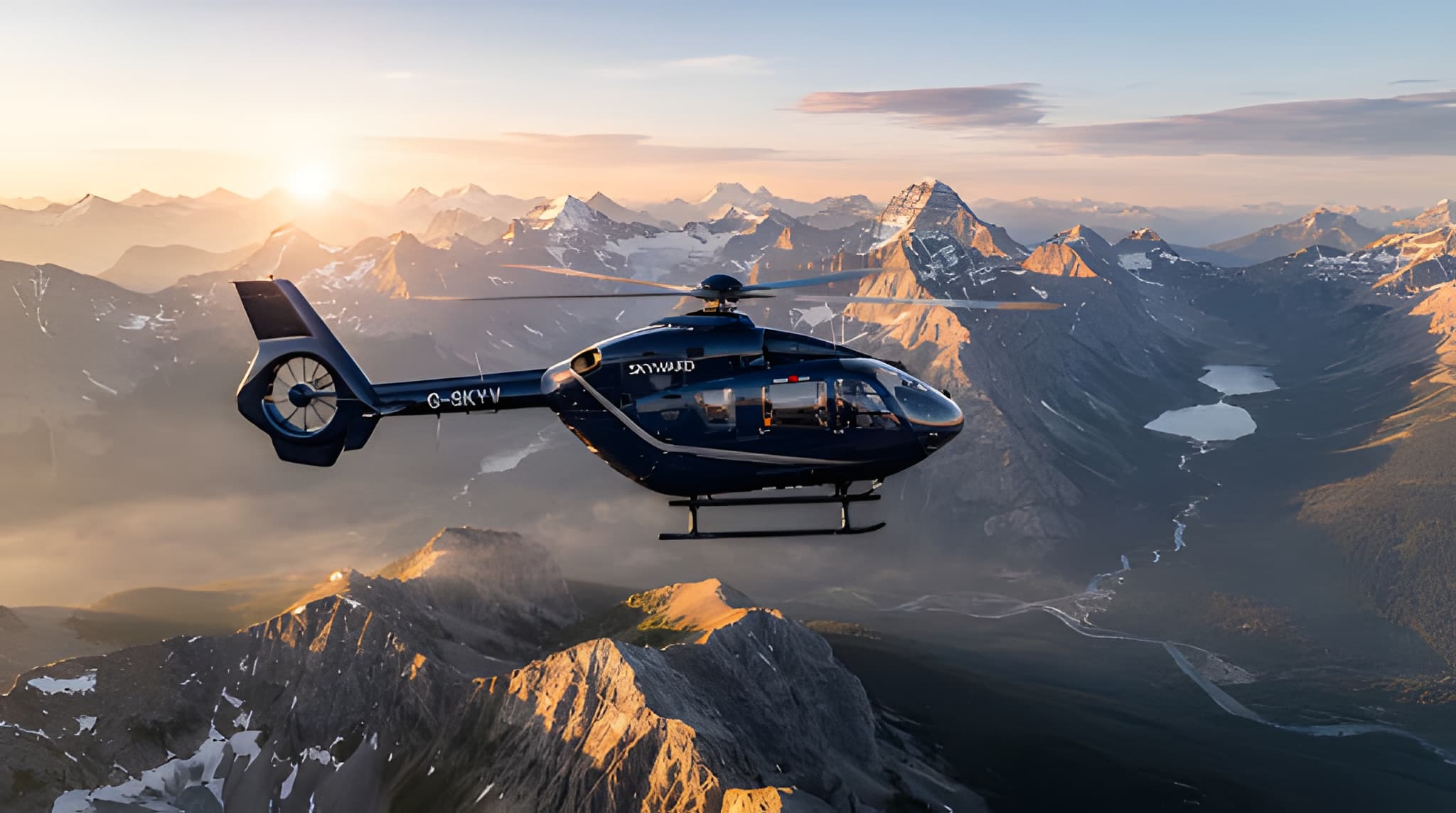 Helicopter flying above a mountain range at sunrise
